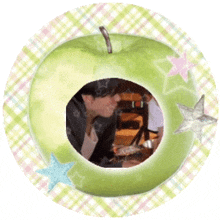 a green apple with a picture in it