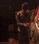 a blurry photo of a man and a woman with imgflip.com written on the bottom right