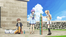 a group of anime characters are playing a game with a stack of boxes that say ' a ' on them