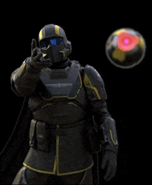 a futuristic soldier is giving the thumbs up sign while standing in front of a sphere .