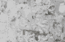 a black and white photo of a field with the year 1967 on the bottom