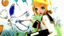 a girl is holding a brush and painting a bird