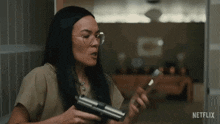 pointing a gun on the phone amy lau ali wong beef angry