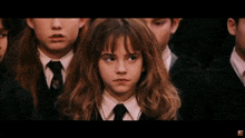 a young girl in a school uniform says fuck