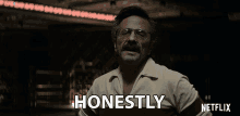a man with glasses and a mustache is saying honestly