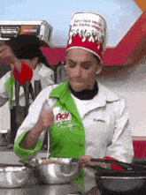 a woman is wearing a chef 's hat that says " barriga vacío no tiene alegria "