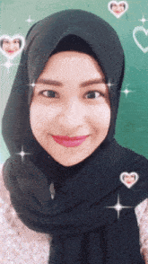 a woman wearing a black hijab and pink lipstick smiles for the camera
