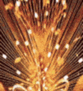 a close up of a fireworks display in the sky