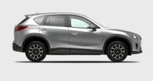 a silver mazda cx-5 is shown in a side view on a white background