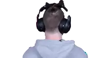 a man wearing headphones with a cat ear on the back of his head