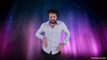 a man in a white shirt is standing in front of a purple background with think jules written in red