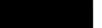 a glowing object is floating in the air in a dark room .