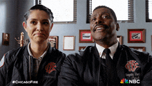 a man and a woman are standing next to each other and their jackets say deputy chief