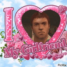 a picture of a man in a pink heart with the words i love my girlfriend