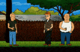 three men standing in front of a wooden fence with one wearing a hat that says ' king of the hill '