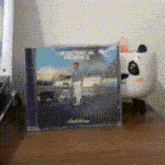 a cd case with a picture of a man on it and the words " almost home "