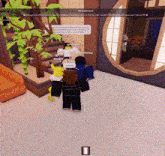 a group of people standing in a room with a mirror