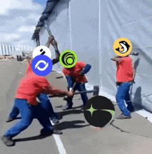 a group of construction workers are holding a hammer and a circle with a s on it