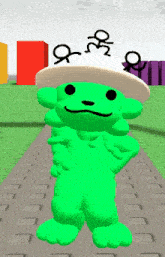 a green frog wearing a white hat with the letters o and m on it