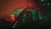 a woman in a taxi with the number 310 on top of it