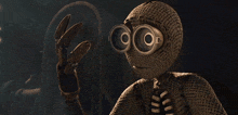 a cartoon character is wearing a pair of goggles and a mask