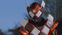 a robot with the word chocolate on his chest