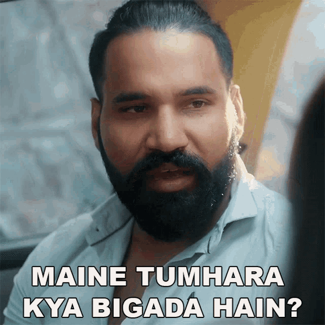 a man with a beard has the words maine tumhara kya bigada hain written on his face