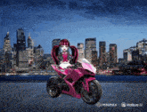 a monster high doll riding a pink motorcycle in front of a city skyline