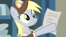 a pony wearing a hat with the letter b on it