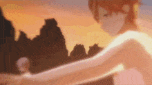 a woman is standing in front of a sunset with her arms outstretched
