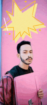 a man holding a pink suitcase in front of a pink background