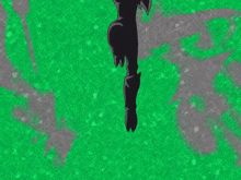 a silhouette of a person standing on a green and gray background