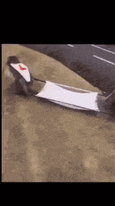 a monkey wearing a knight 's armor is pulling a stretcher down a hill