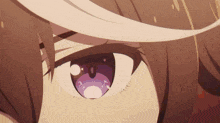 a close up of a person 's eye with a purple pupil and a white eyebrow