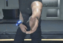 a man 's arm is shown in a blurred image
