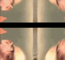 a blurred image of a person 's face with a black border