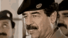 صدام GIF - Saddam Hussein Talking Soldier GIFs