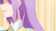a girl with purple hair is standing in front of a wall