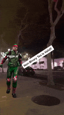 a man in a green and red costume is walking down a street