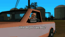 a man is driving a truck with the words " what do you want boy " on the side