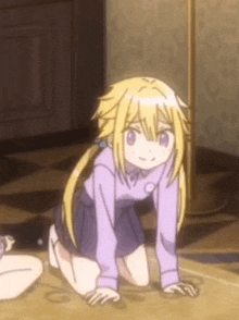 a girl is kneeling on the floor in a room .