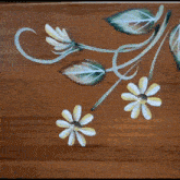 a snowflake is on a wooden table with chinese writing