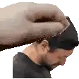 a hand is holding a man 's head in a pixel art .