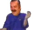 a man with a mustache is wearing a blue shirt and laughing with his fist in the air .