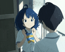 a girl with blue hair is standing next to a boy with black hair