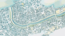 a map of a city with a few buildings and a river in the background
