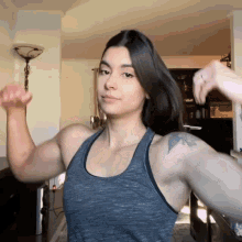 Girl Flexing Female Bodybuilder GIF - Girl Flexing Female Bodybuilder Muscuar Girl GIFs