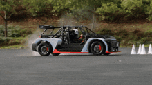 a race car with the letter n on the side