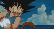 a cartoon character named goku is holding a ball in his hand