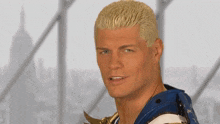 a close up of a man with blonde hair wearing a blue and white outfit .